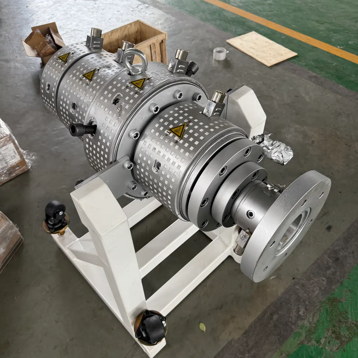 PPR pipe leaving the die head on a hot and cold water pipe extrusion line