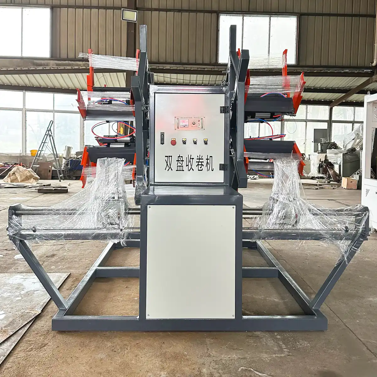 Haul-off, length counter and pipe coiler positioned in line on a plastic pipe extrusion floor