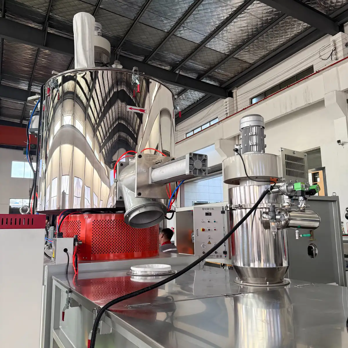 Pneumatic discharge valve of a mixer cycled open and closed during inspection