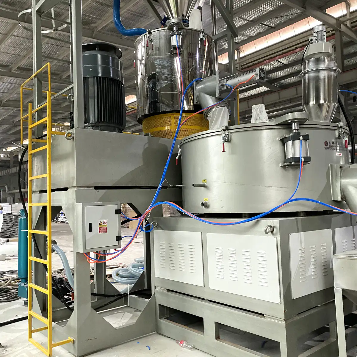 Pneumatic discharge valve of a mixer cycled open and closed during inspection