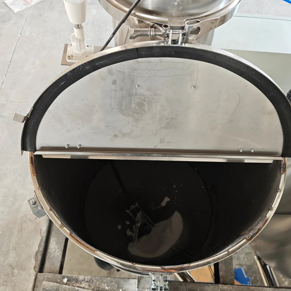 Hopper interior showing corners where material can accumulate between production runs