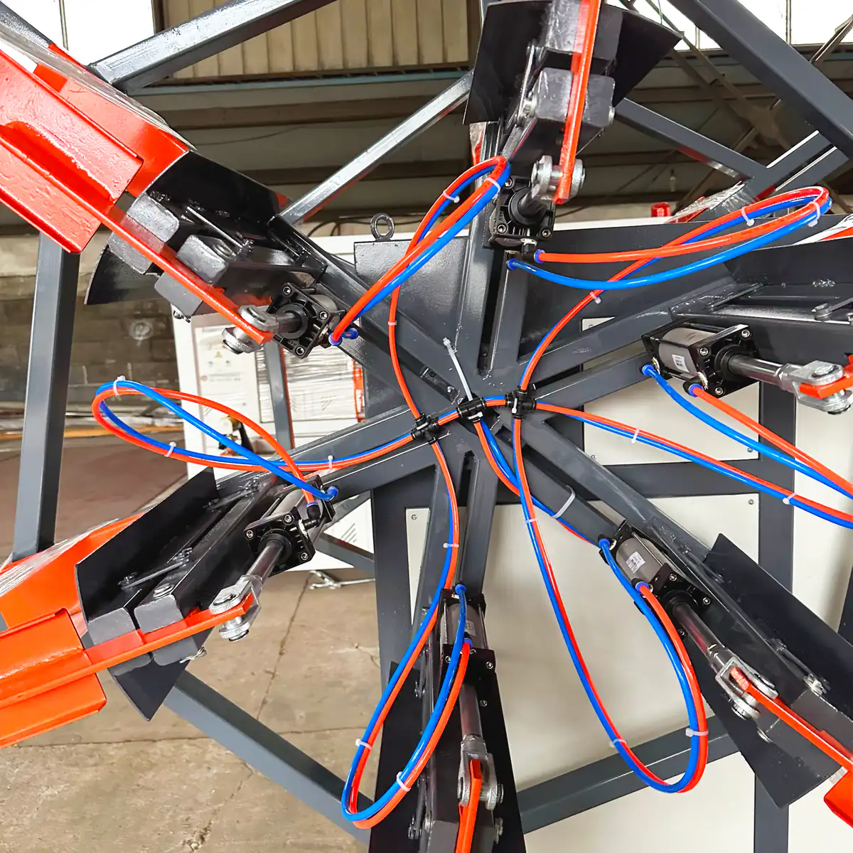 Traverse guide moving pipe across the coil width on an automatic coiler